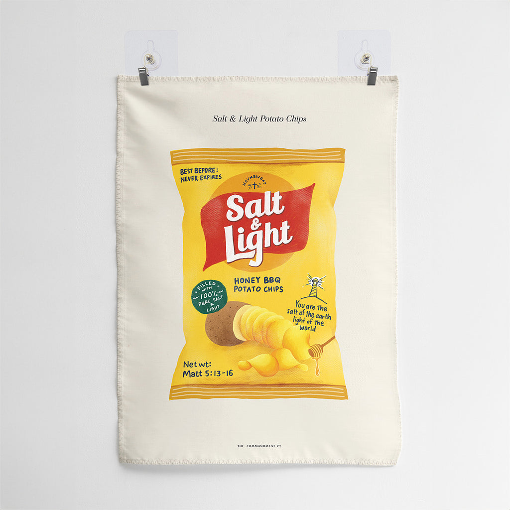 Wall tapestry featuring a playful potato chips design labeled 'Salt & Light' with the scripture Matthew 5:13-16, symbolizing being the salt of the earth and the light of the world in a creative and inspiring way.