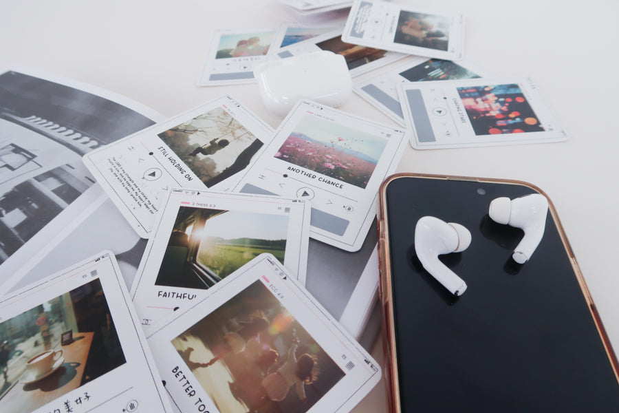 Christian scratch card with earbuds for listening to faith-based music