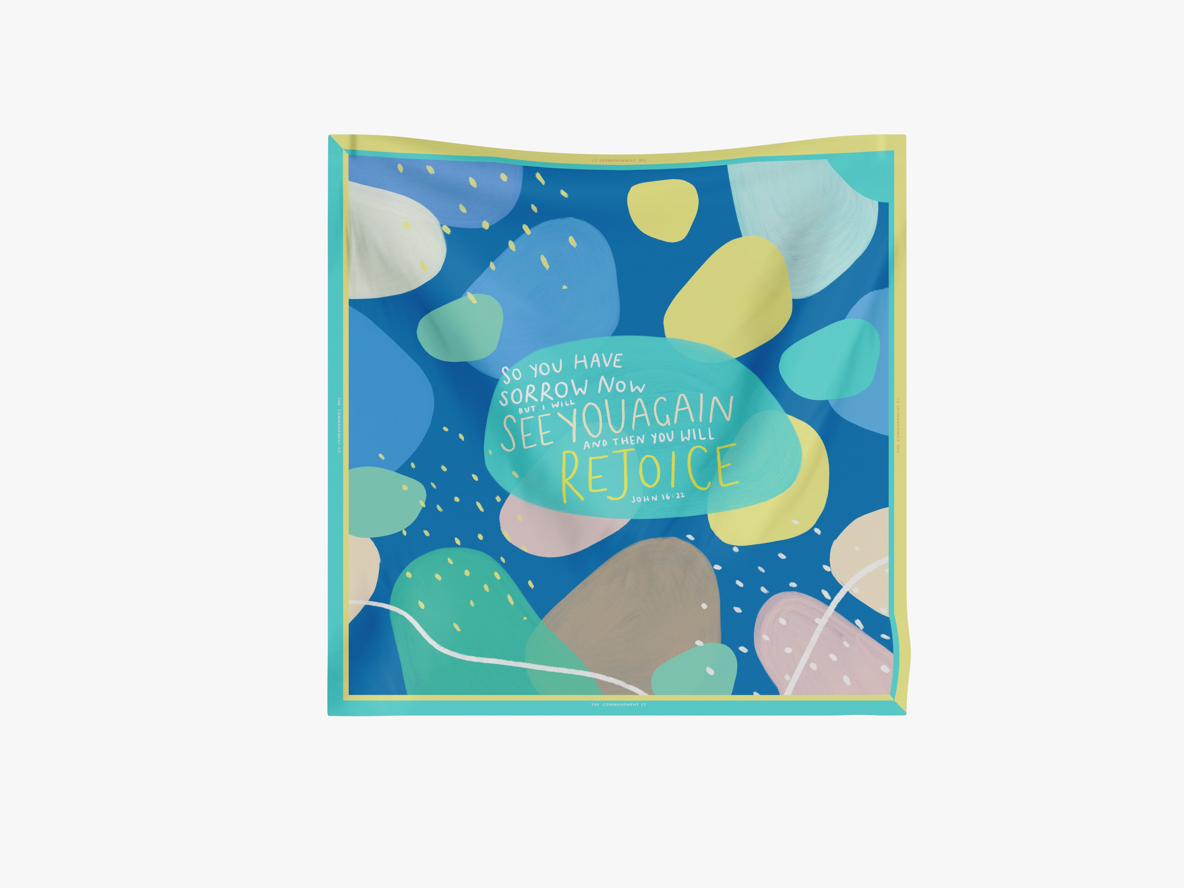 See You Again Scarf featuring John 16:22 in an abstract multicolor print with teal border, a faith-forward accessory by The Commandment Co