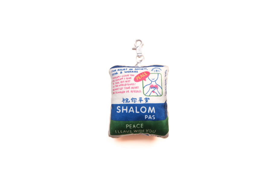Shalom Pas plushie keychain with relief patch-inspired design and John 14:27 peace reminder.