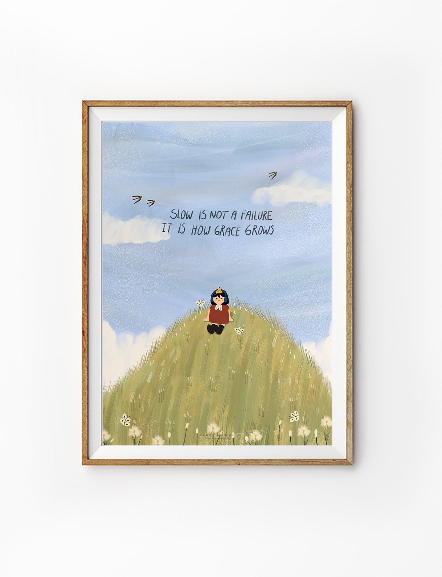 Christian encouragement poster featuring the phrase “Slow is not a failure, it is how grace grows” with a girl sitting on a grassy hill under a blue sky.