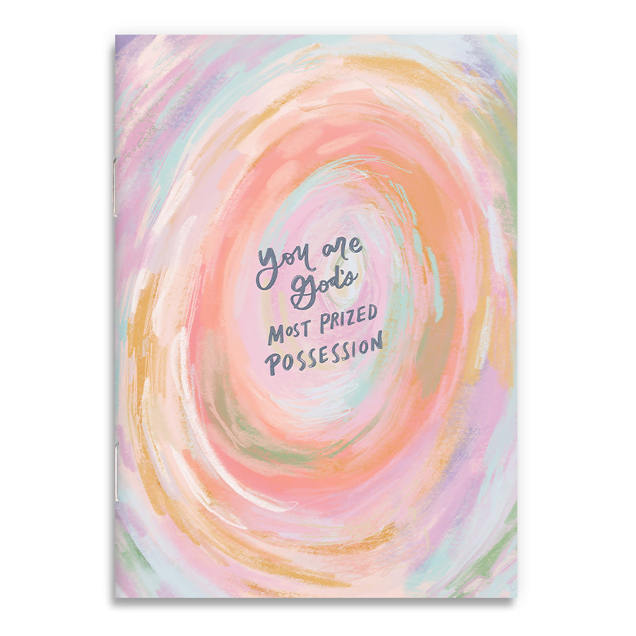 Colorful swirl illustration with text ‘You are God’s Most Prized Possession’ on a Christian A6 notebook cover.