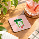 Pink drink-themed Christian coaster on a wooden table next to a berry drink.