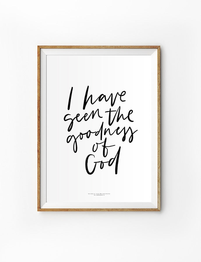 A framed poster with the quote 'I have seen the goodness of God' written in a handwritten-style black script on a white background.