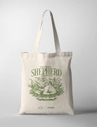 The Lord Is My Shepherd tote bag featuring Psalm 23:1 with lamb and greenery illustration, created in collaboration with Salt&Light and The Commandment Co.