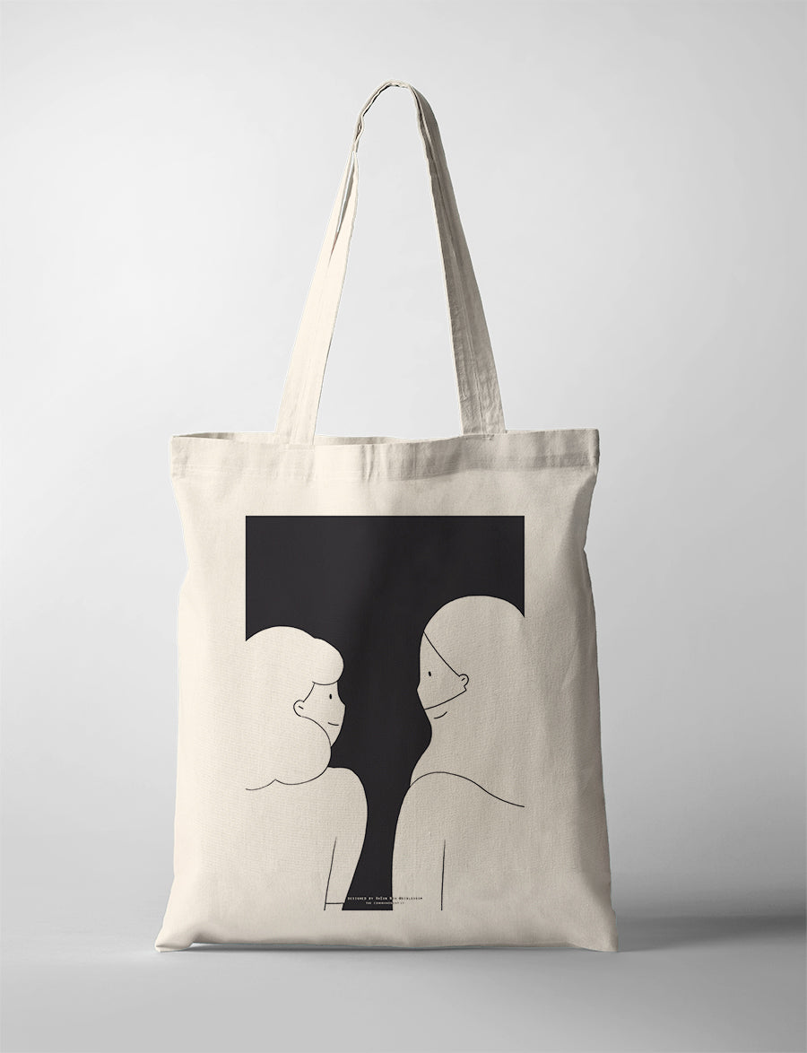 “The True Light” Christian tote bag featuring illustration of two people in a boat at sunset, faith-inspired canvas bag.