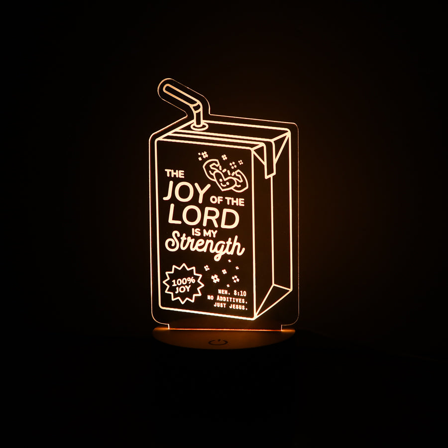 Christian night light shaped like a juice box engraved with ‘The Joy of the Lord Is My Strength’ from Nehemiah 8:10 – faith-inspired LED lamp from The Commandment Co