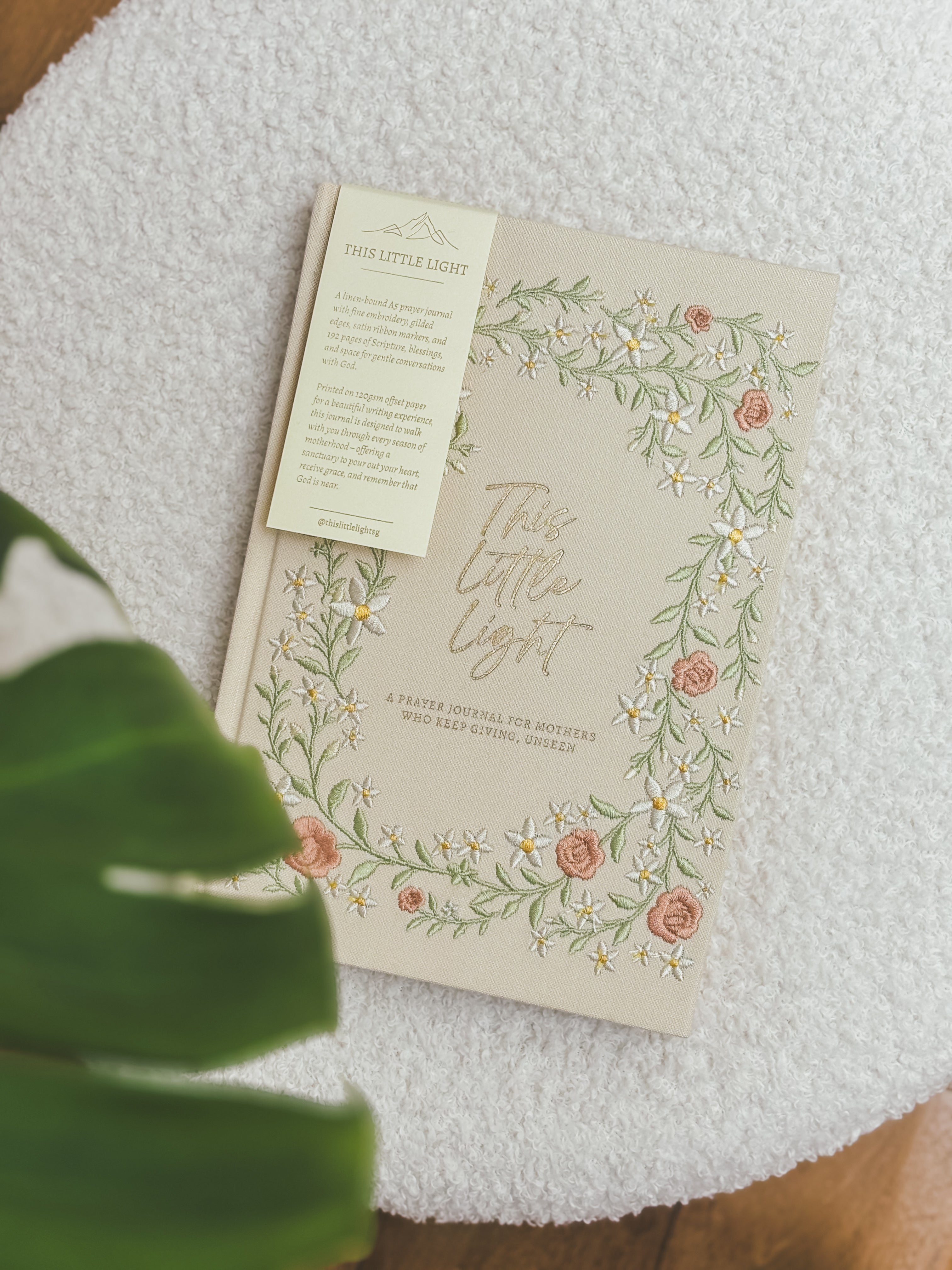 This Little Light prayer journal for mothers with floral embroidered cover and bookmark tag