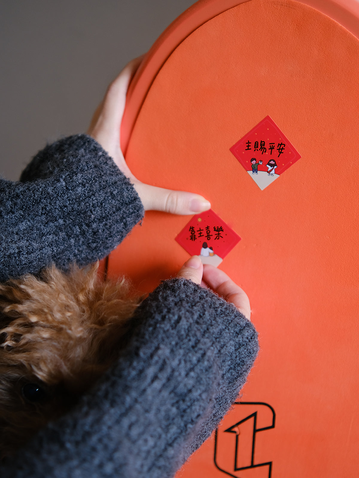 Mini Chinese New Year couplet stickers decorating luggage with festive red blessing designs