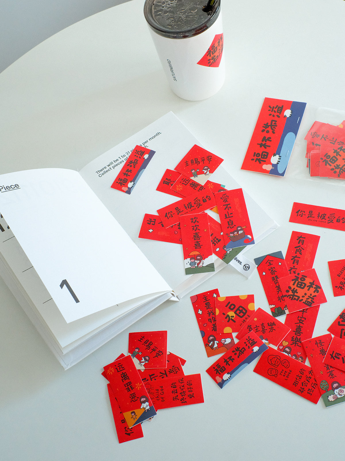 Mini Chinese New Year couplet stickers placed on planner pages, festive red CNY blessing stickers for everyday use