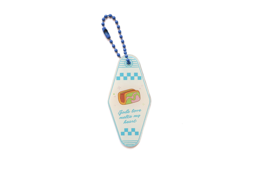 Front view of traditional ice cream bread Christian acrylic keychain featuring “God’s love melts my heart” with blue ball chain