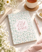 Trust in the Lord A5 notebook with pastel botanicals and Proverbs 3:5 on a bright desk