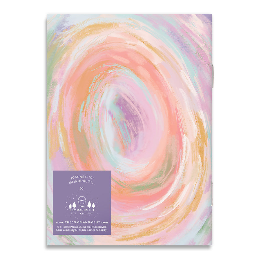 Back cover of a Christian A6 notebook featuring pastel swirl design with faith-inspired artwork.