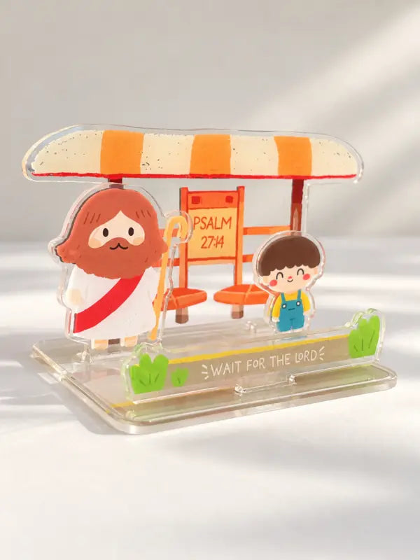 Angled view of the Psalm 27:14 bus stop acrylic phone stand