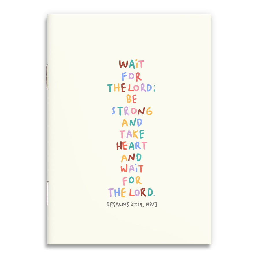 A6 Christian notebook featuring playful, hand-lettered pastel typography with the Bible verse “Wait for the Lord; be strong and take heart and wait for the Lord” from Psalm 27:14 (NIV), illustrated by Moojigae Drawing.
