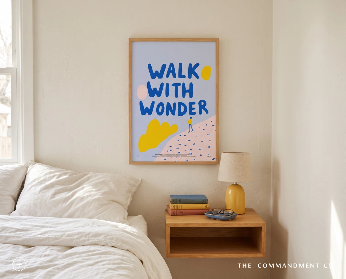Walk with Wonder Christian poster displayed above a bedside table in a warm neutral bedroom