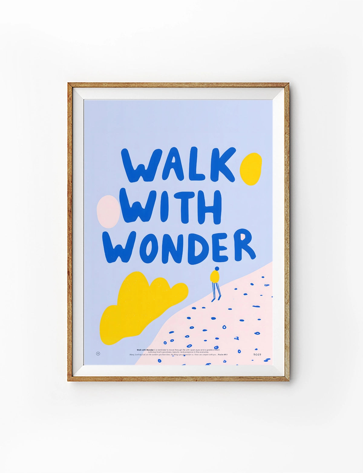 Walk with Wonder Christian poster with blue lettering and colourful abstract details in a wooden frame