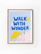 Walk with Wonder Christian poster with blue lettering and colourful abstract details in a wooden frame