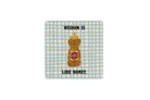 Wisdom Is Like Honey coaster with honey bear illustration and blue gingham background, designed by Thir.st in collaboration with The Commandment Co.