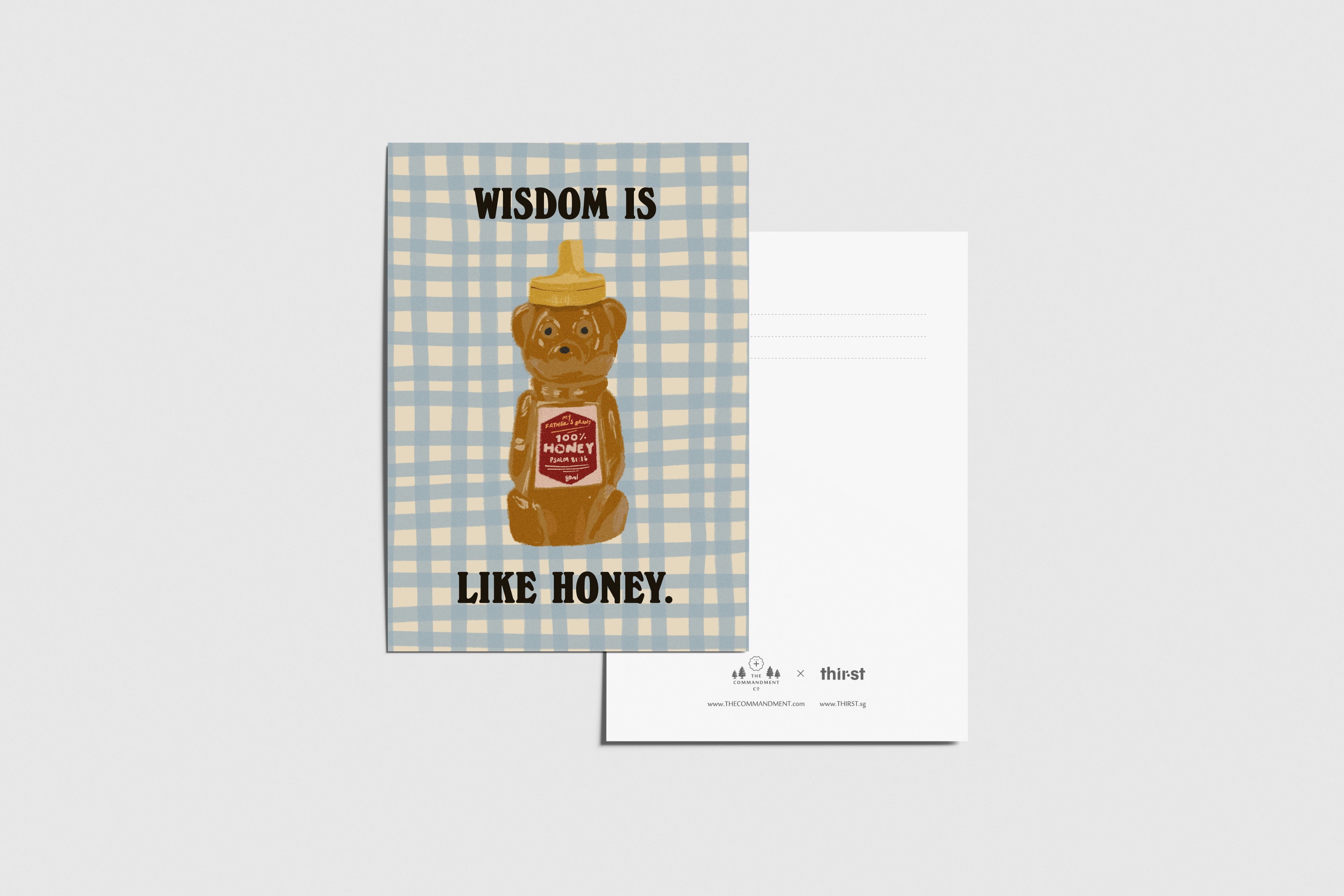 Wisdom Is Like Honey postcard with honey bear illustration and gingham background, designed by Thir.st in collaboration with The Commandment Co.