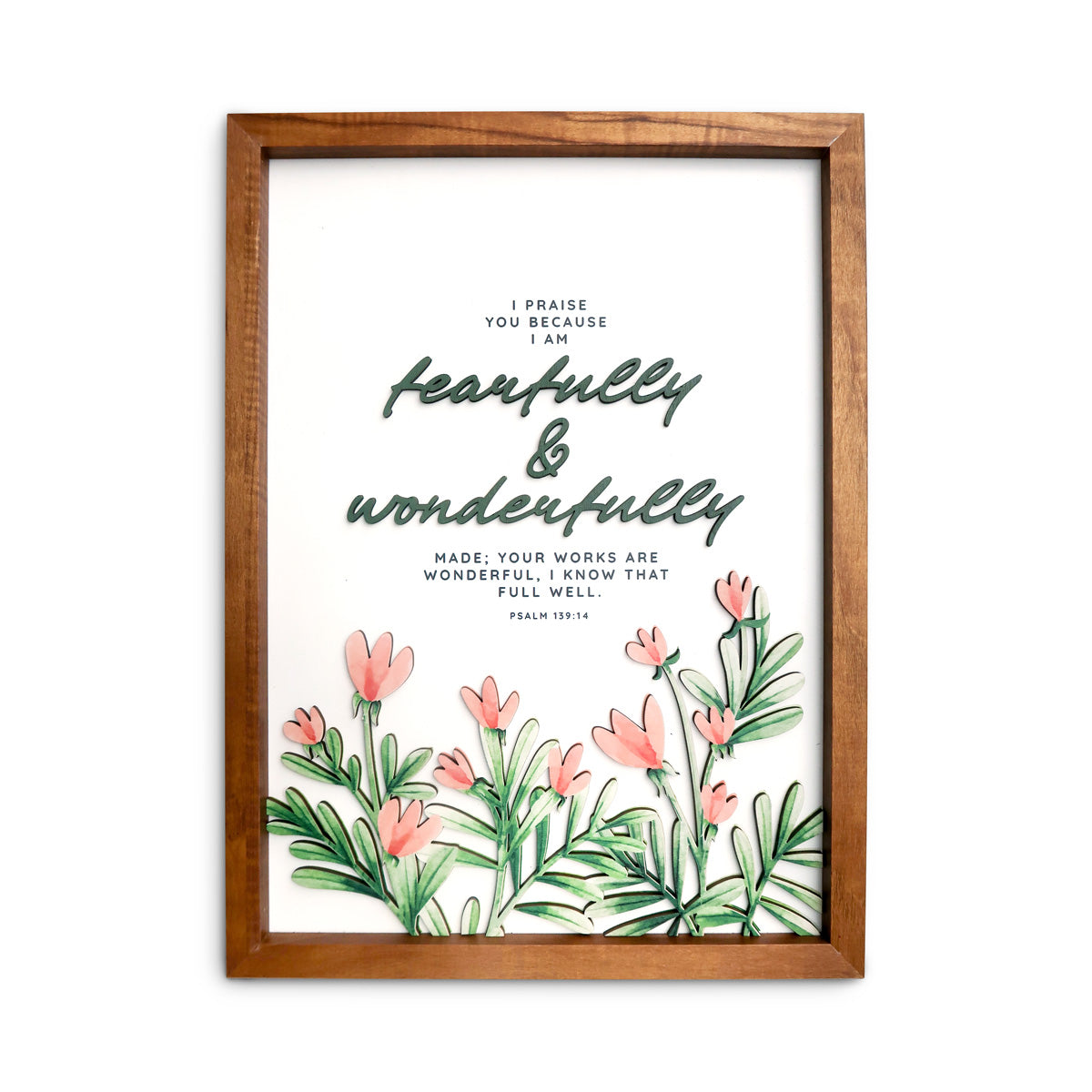 A wooden-framed wall art featuring the Bible verse "I praise you because I am fearfully and wonderfully made; your works are wonderful, I know that full well" from Psalm 139:14, adorned with floral illustrations for a faith-inspired decorative piece.