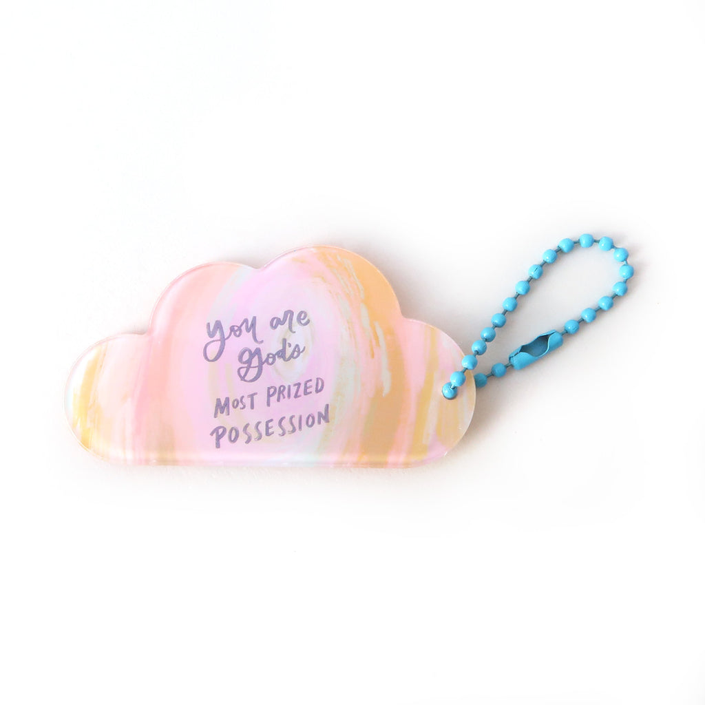 Cloud-shaped Christian keychain featuring the text 'You are God's most prized possession,' designed as an inspirational and faith-based accessory.