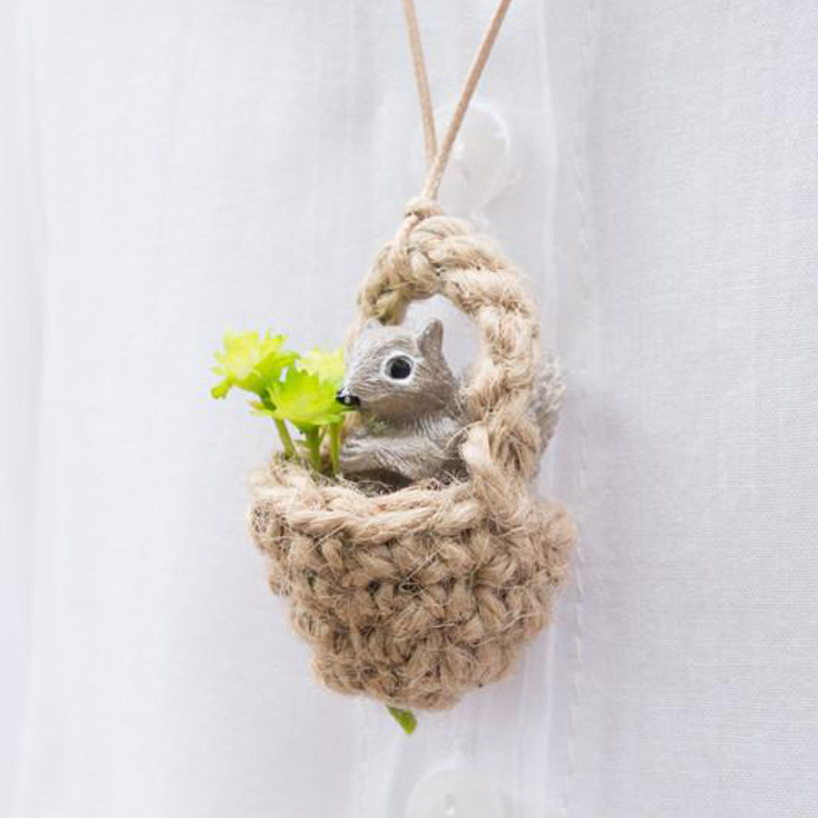 Praying squirrel necklace. A cute squirrel in an acorn praying.