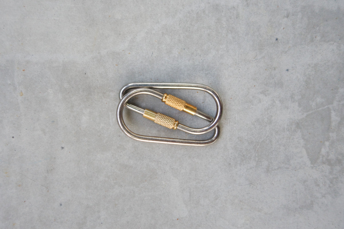 Durable titanium and brass carabiner