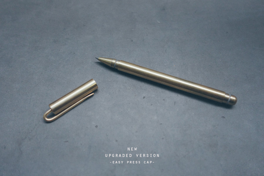 Classic brass pen with simple press cap