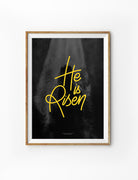 He is risen bright yellow text with dark background Christian poster design for home wall art