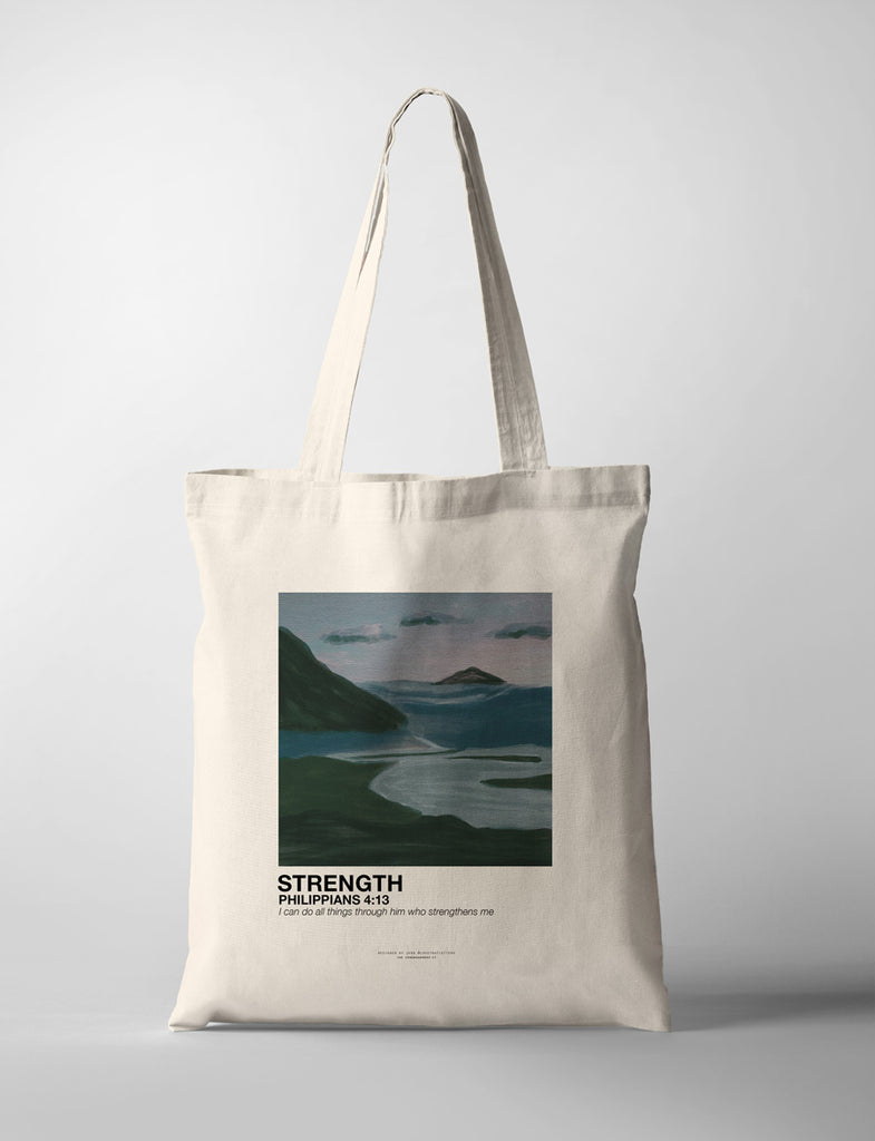 tote bag with mountains and sea landscape design and encouraging wordings