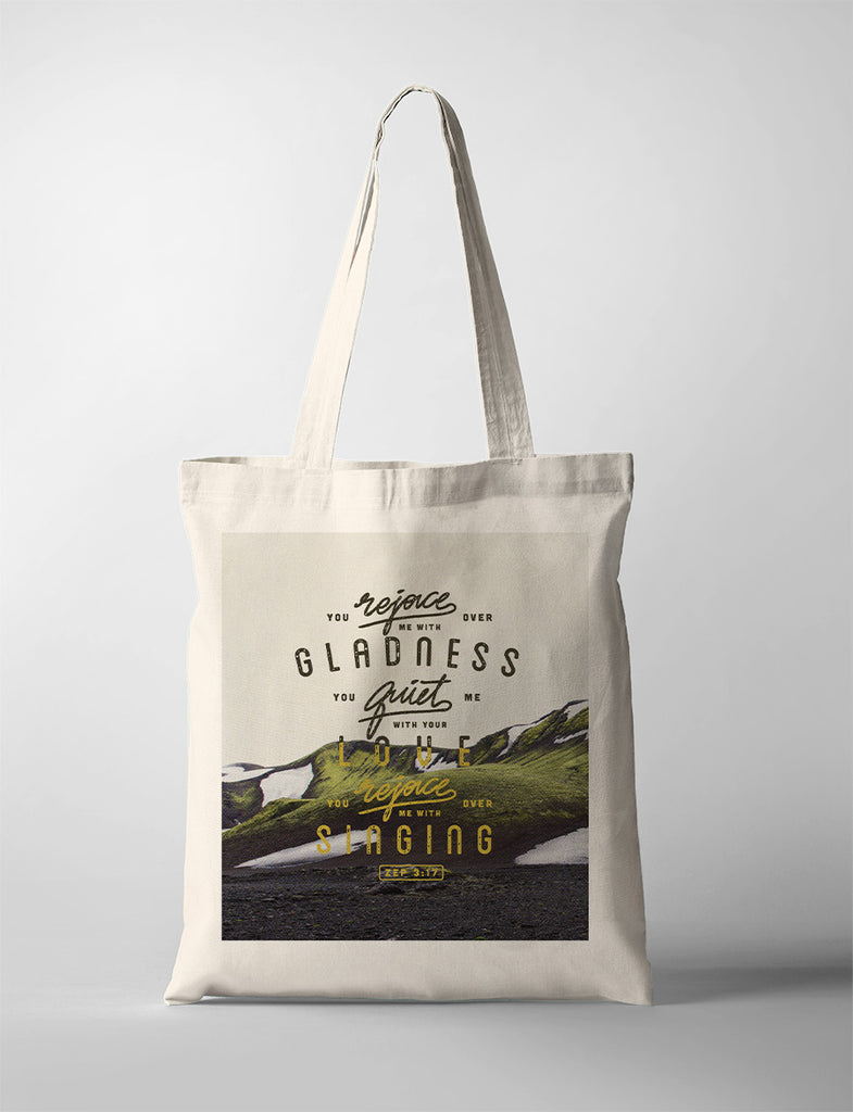 tote bag design that says "You rejoice over me with gladness, you quiet me with your love, you rejoice over me with singing"