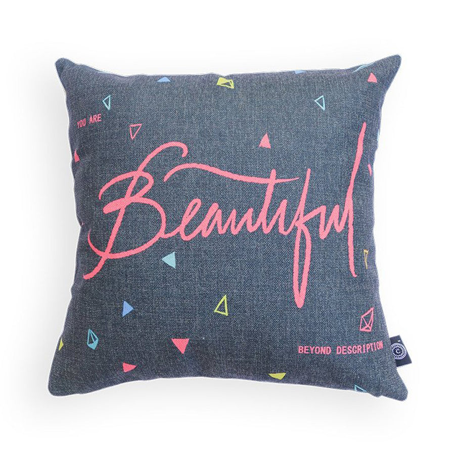 Gray linen cushion cover with triangles design and the word 'Beautiful'