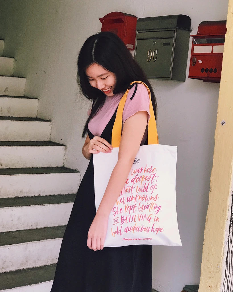 BELIEVING En:Courage canvas tote bag by The Brave Assembly, front product view.