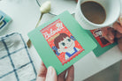 Beloved Child of God wooden Christian coaster beside a drink