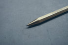 Hex II Classic brass ballpoint pen tip detail.