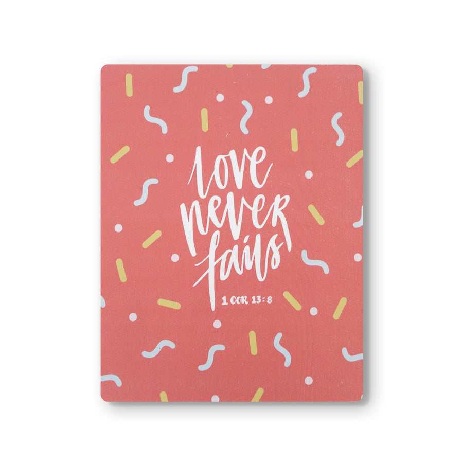 motivational bible verse ‘Love never fails’ on red confetti background digitally printed on 16cmx20cm quality pine wood.