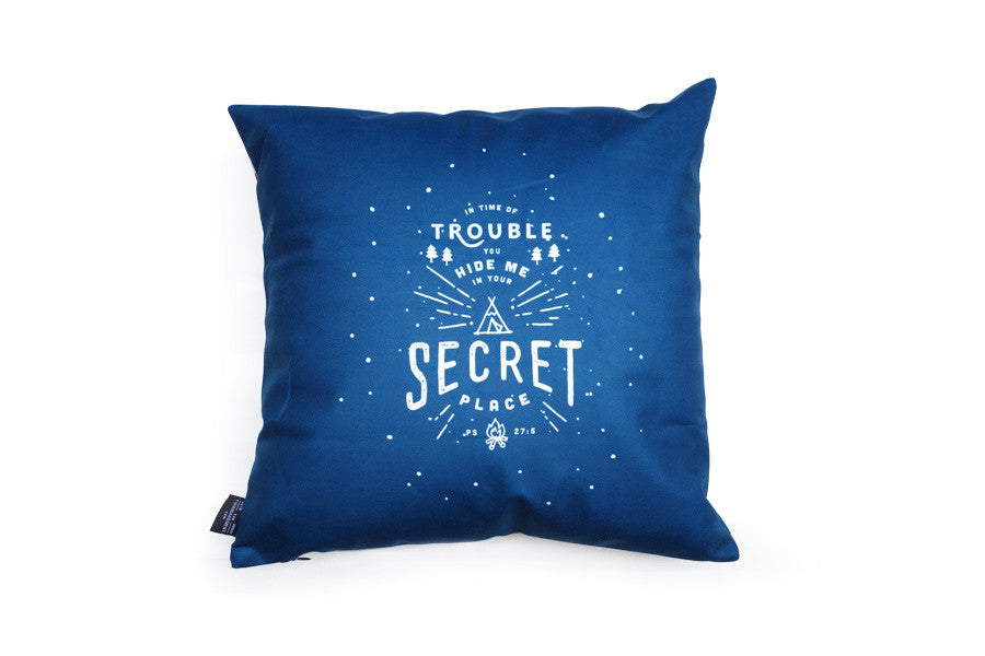 The back of cushion cover same designs but with navy blue background