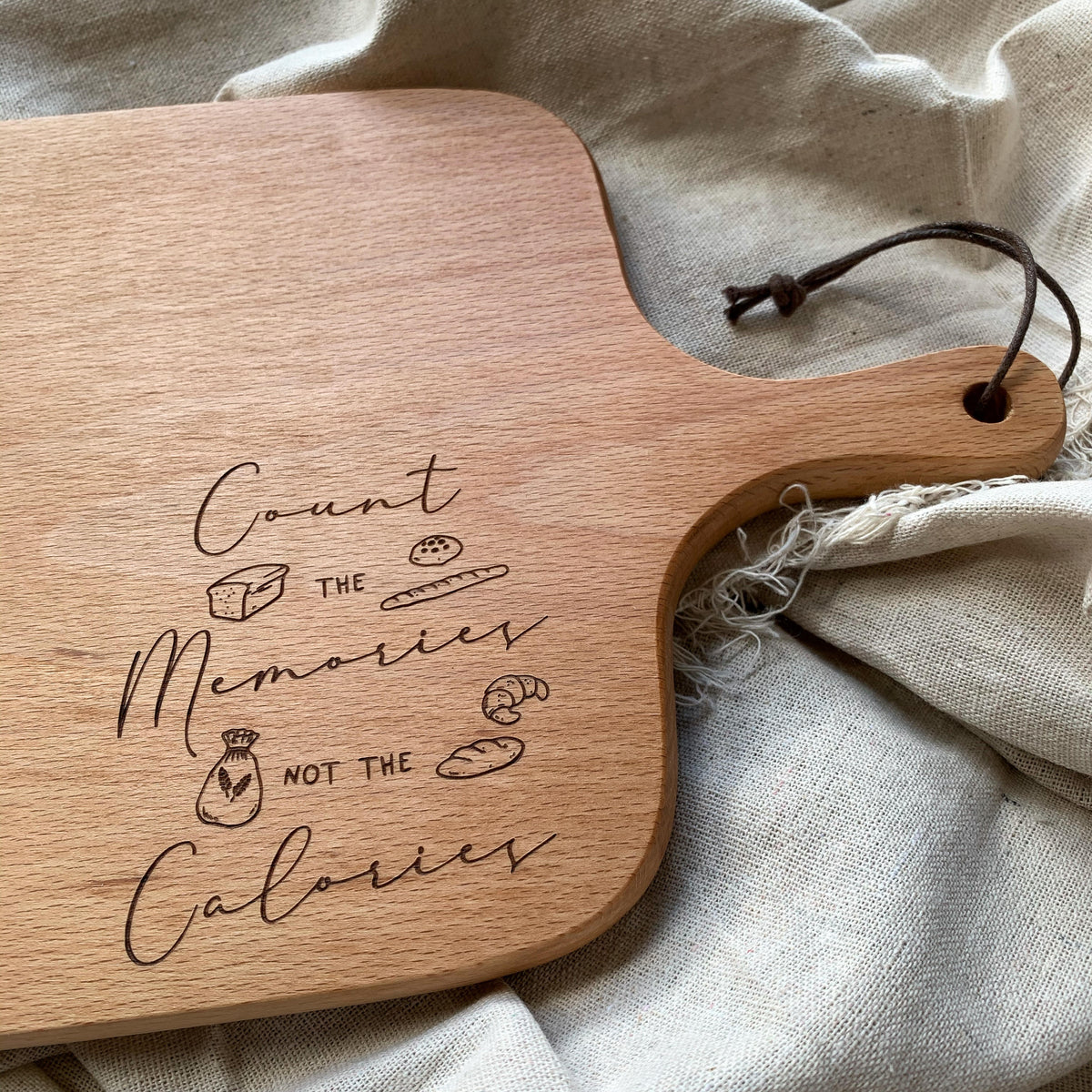 Count The Memories beech wooden serving board by Thycupbearer, front product view.