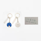 back side of Jesus and Me enamel keychain design that says "God be with you"