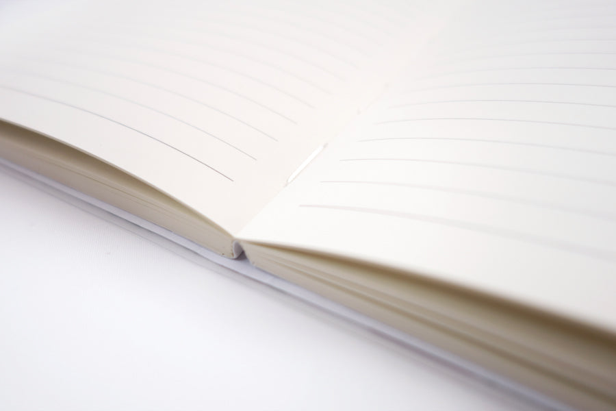 Great Is Your Faithfulness A5 notebook opened to show its lined writing pages.