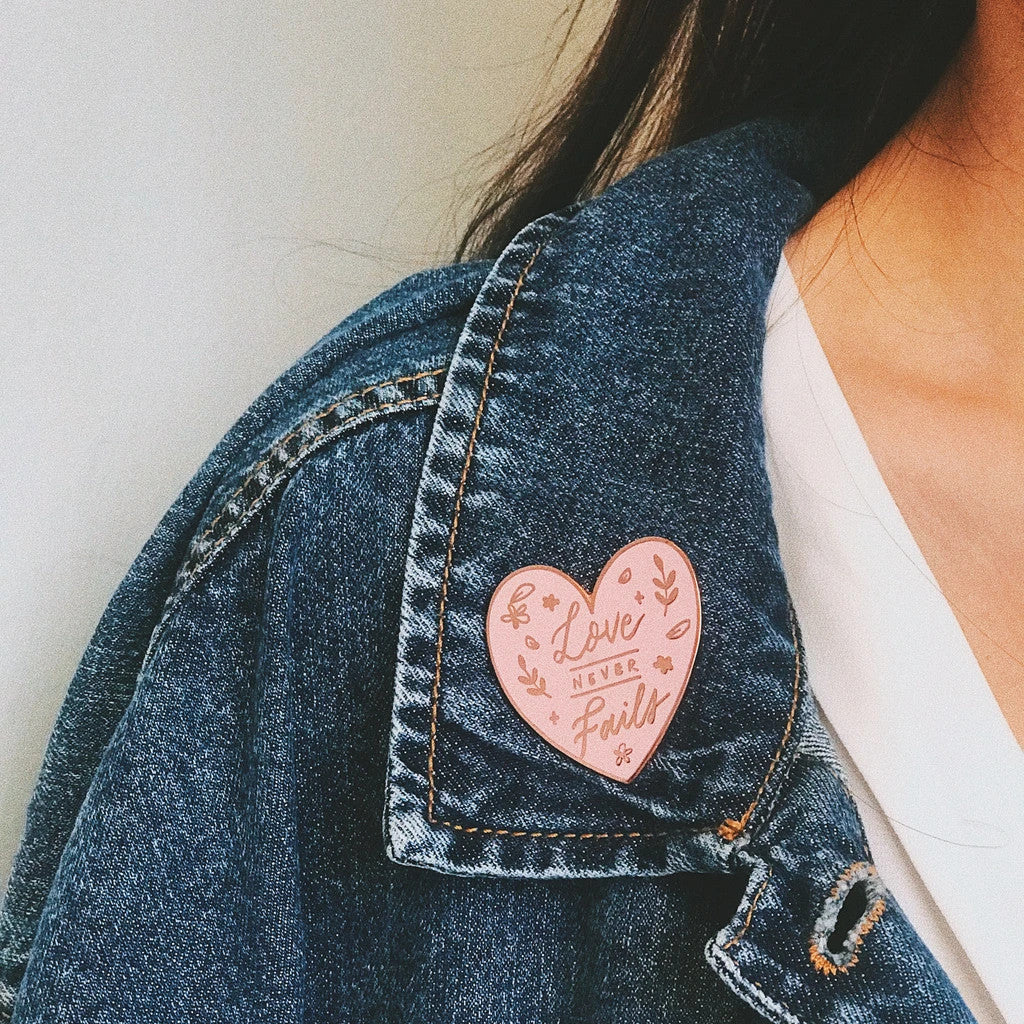 Carry a little positivity wherever you go. Wear the pins out proudly as part of your outfit ensemble.