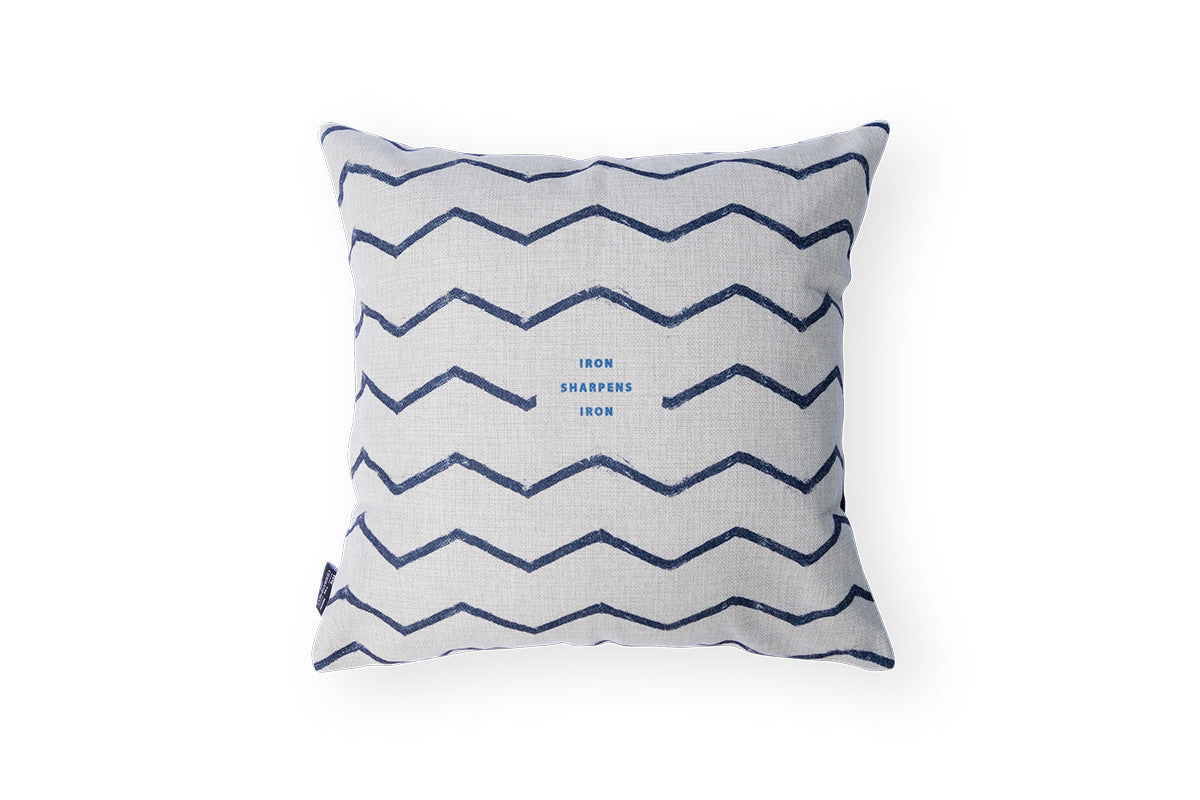 Back design shows blue zigzags on gray linen and the verse at the centre