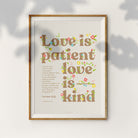 Square view of Love Is Patient Love Is Kind poster with beige background and brown wording.