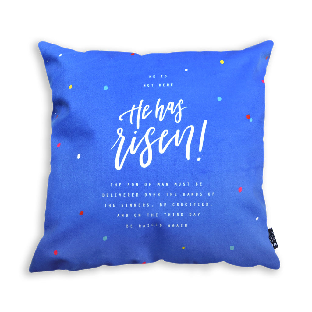 Blue cushion cover with white font typography on cushion cover
