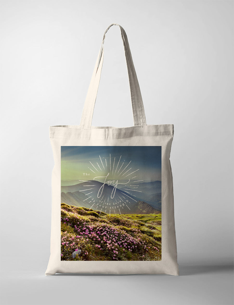 tote bag design that says "The joy of the Lord is your strength."