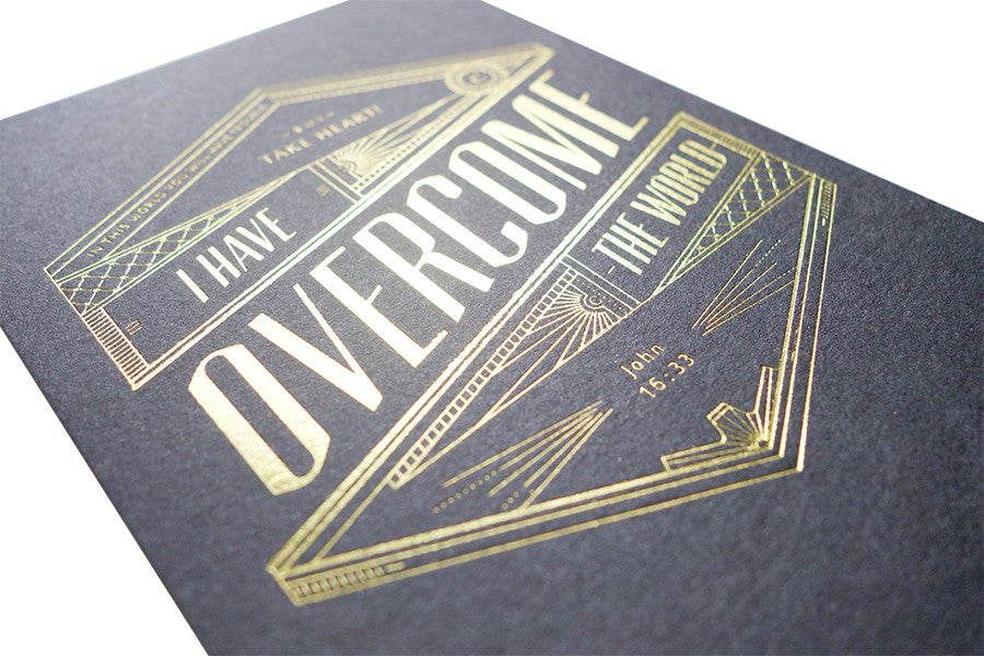 The background of the card is matte black and allows the golden font to stand out more.