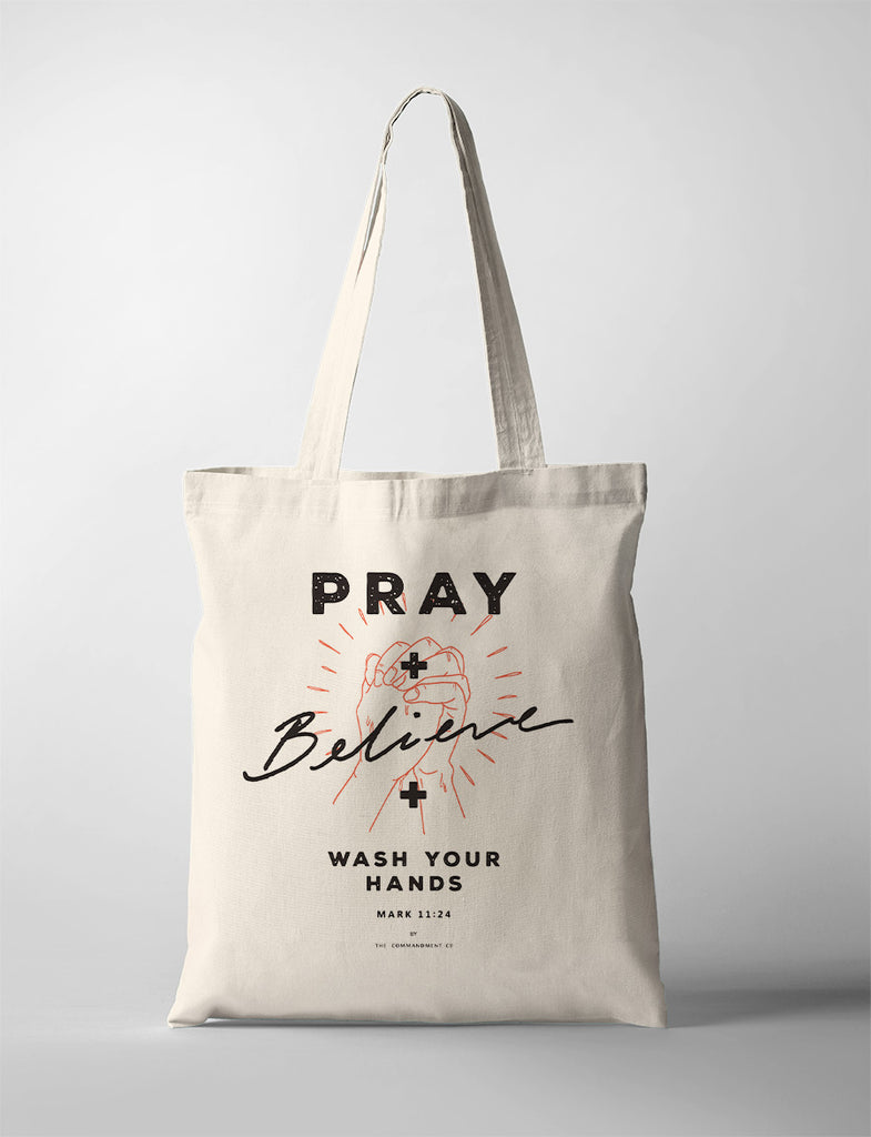Pray and Believe and Wash your hands special Covid-19 merch tote bag by The Commandment Co