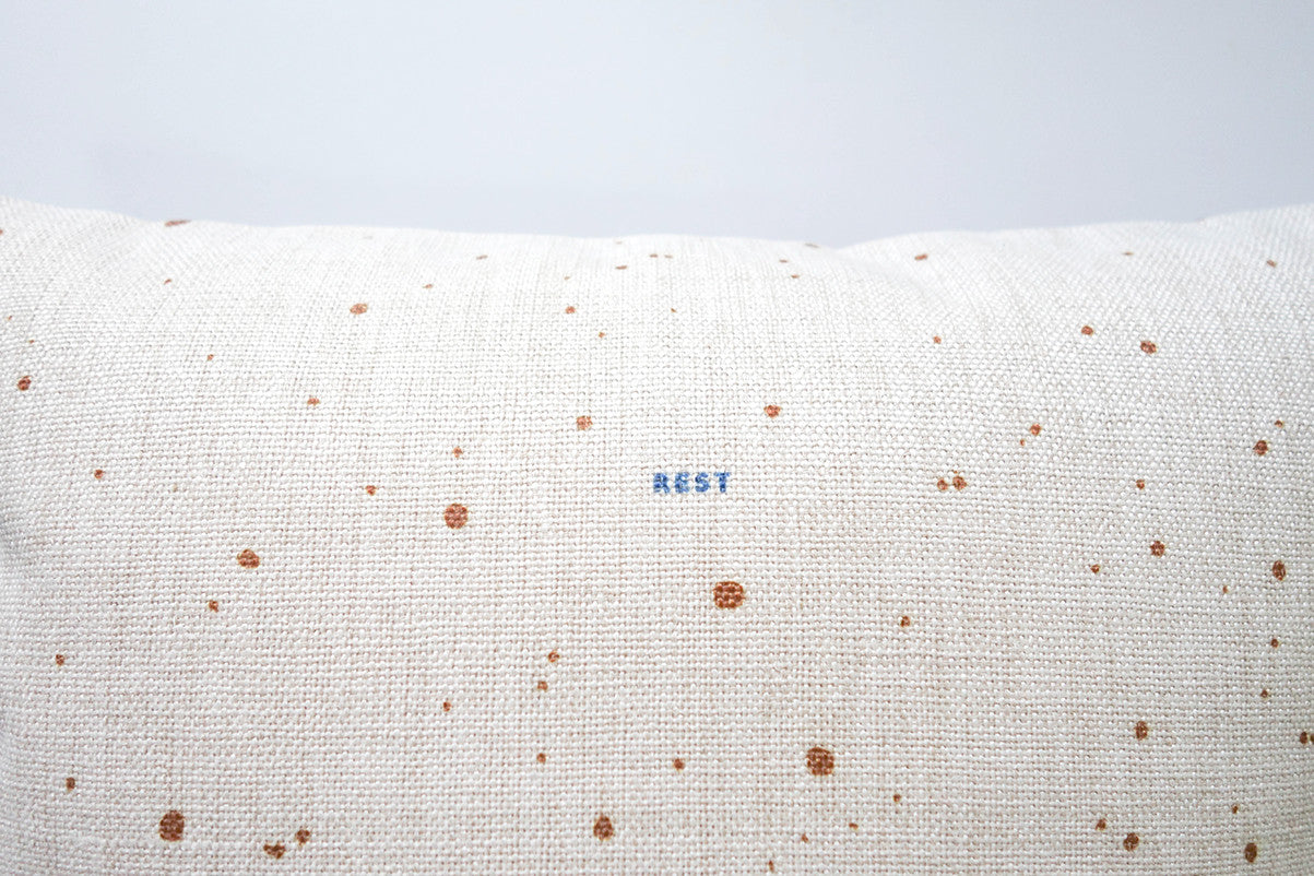 Close-up of the Rest Christian cushion cover cotton linen material