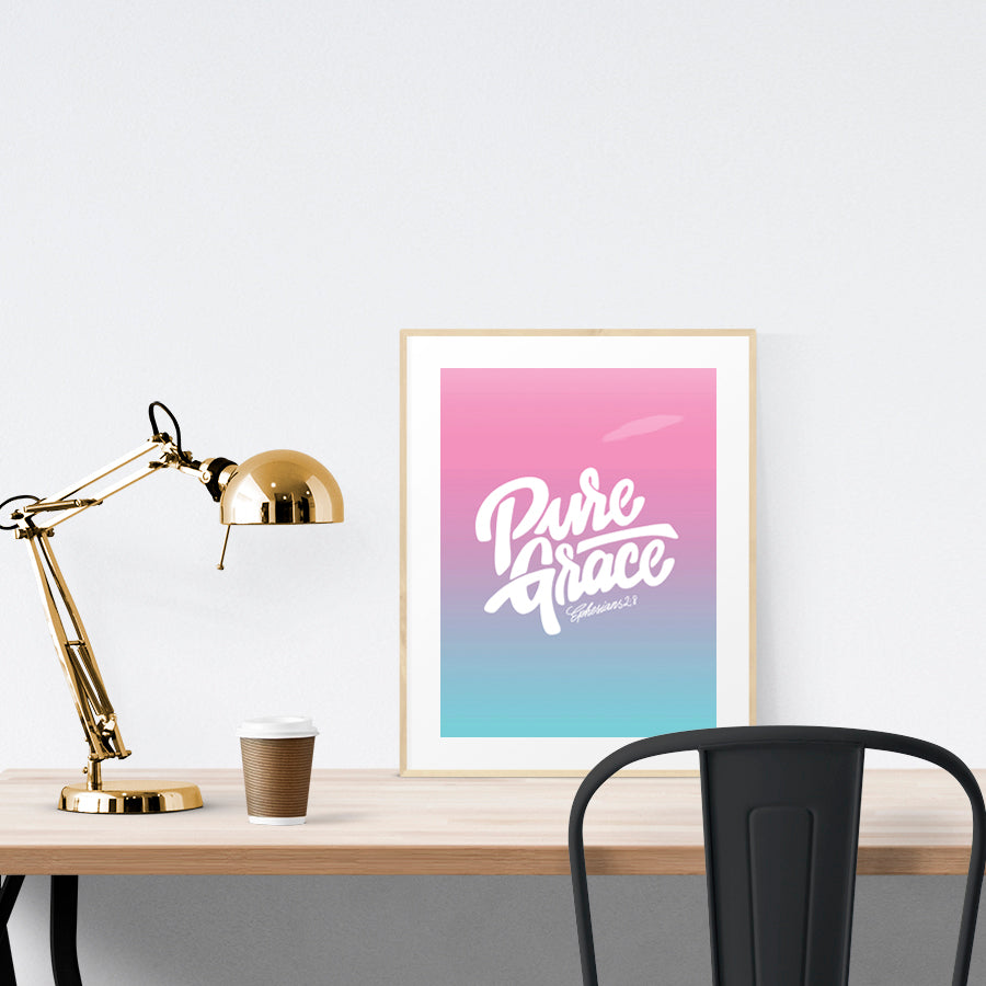 Poster placed on table. Adds a splash of colour to your workspace. Modern unconventional workspace decor ideas.